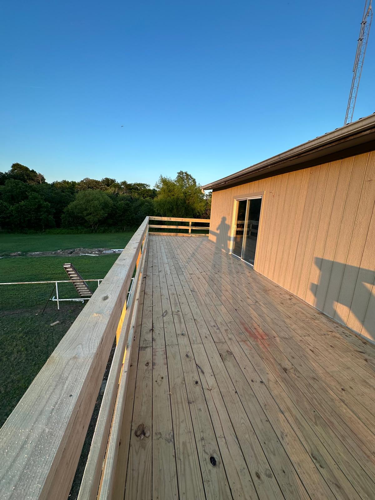 Custom deck outdoor living space by Innovation General Construction LLC